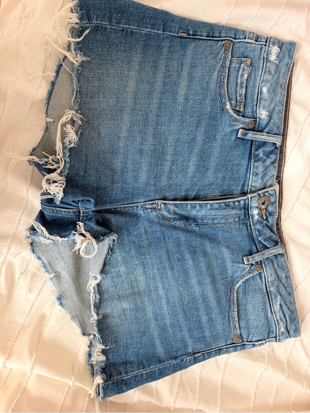 PAIGE Light Blue Distressed Cutoff Jean Shorts